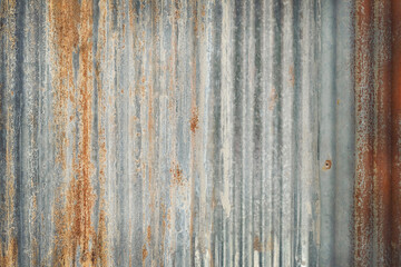 Old zinc wall texture background, rusty on galvanized metal panel sheeting.