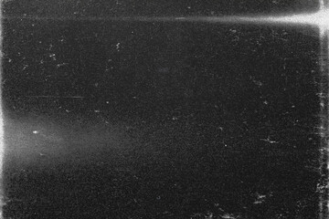retro film overlay effect with scratch dust and motion blur light leaks,retro grain noisy film distressed light leak flare on black background,black and white abstract background,old film texture