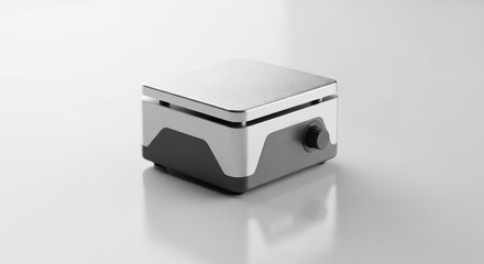 Single Laboratory Magnet Stirrer on Smooth White Surface with Soft Reflection