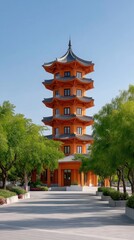 Vibrant Orange Pagoda Tower Surrounded by Lush Green Trees Under a Clear Blue Sky