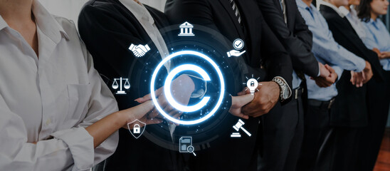 This image features a group of diverse business professionals, emphasizing collaboration around a...