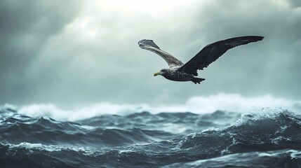 Naklejka premium A lone seabird flies through a stormy sky above crashing waves.
