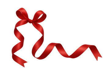 Red ribbon bow and flowing satin streamers creating a festive decoration, having a transparent background