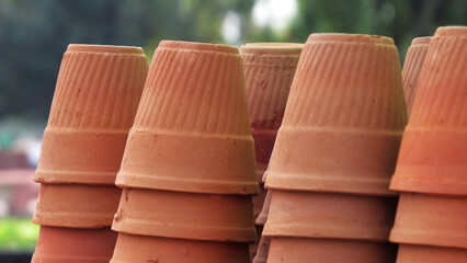 Earthenware glasses stacked at a street tea stall