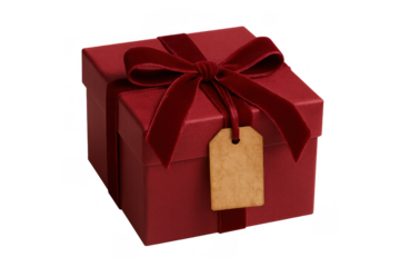 Red gift box with velvet ribbon and blank tag, symbolizing celebration, surprise, and special occasion