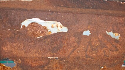 The vintage car is rusty.