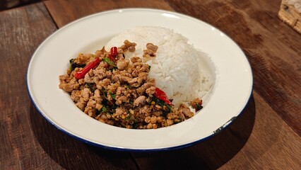 Stir fry pork with holy basil.