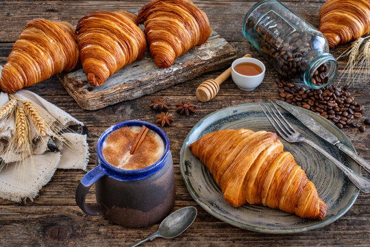 Fresh French croissants in the plate. 