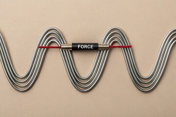 Abstract Representation of Force with Metal Springs and Red String