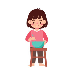 A young girl, standing on a stool, mixes ingredients in a bowl.