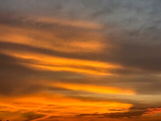 Vivid Orange and Grey Clouds at Sunset image photo