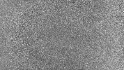 Fototapeta premium Gray wall textured background with subtle grain and fine roughness, ideal for modern design, architectural surfaces, product display, and minimalist creative compositions.