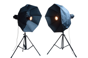 Two studio lights with softboxes illuminate a black backdrop for professional photography and videography on transparent background