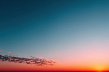 Obraz premium Sky gradient from blue to orange during sunset