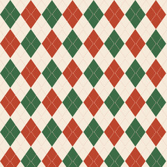 クリスマスのアーガイルチェック柄パターン背景・赤と緑の冬テクスチャー