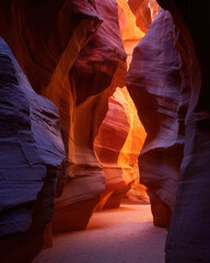 Narrow desert canyon glowing with warm sunlight and smooth carved sandstone walls creating glowing natural passage