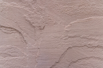 ベージュの漆喰壁テクスチャ背景