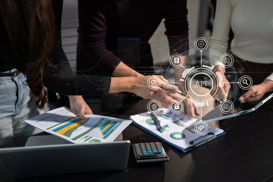 Modern technology and networking concept, woman using laptop,tablet and smartphone with virtual screen API icon Software development tool. API Application Programming Interface. - Powered by Adobe