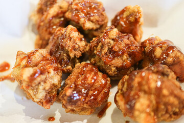 Crispy Korean Fried Chicken (Dakgangjeong) coated in a shiny, sweet, and sticky glaze. A popular...