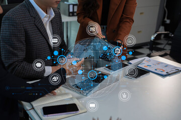 Businessmen team or financial data analysts working with tablets and laptop computers and data...