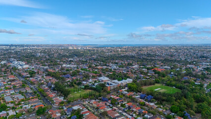 Panorama aerial drone view of western Sydney Suburbs of Canterbury Burwood Ashfield Marrickville Campsie with Houses roads and parks in Sydney New South Wales NSW Australia