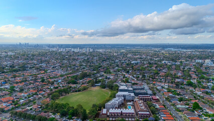 Panorama aerial drone view of western Sydney Suburbs of Canterbury Burwood Ashfield Marrickville Campsie with Houses roads and parks in Sydney New South Wales NSW Australia