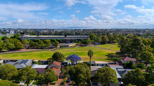 Panorama aerial drone view of western Sydney Suburbs of Canterbury Burwood Ashfield Marrickville Campsie with Houses roads and parks in Sydney New South Wales NSW Australia