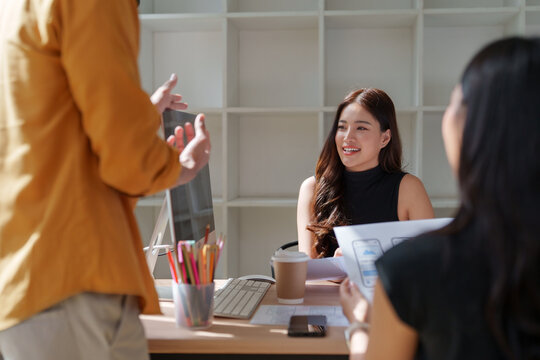 Business team collaborating on ui ux design project