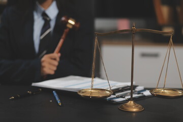 Law theme, mallet of the judge, law enforcement officers, evidence-based cases and documents taken into account.