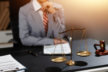 Law theme, mallet of the judge, law enforcement officers, evidence-based cases and documents taken...