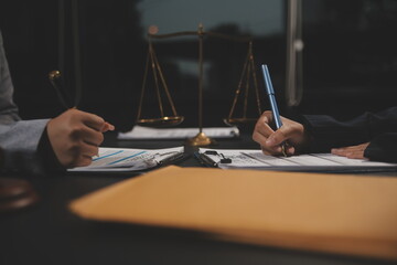 Law theme, mallet of the judge, law enforcement officers, evidence-based cases and documents taken into account.