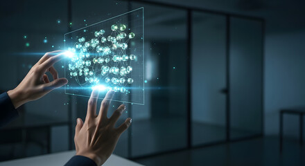 Hands interacting with a futuristic glowing transparent digital interface.