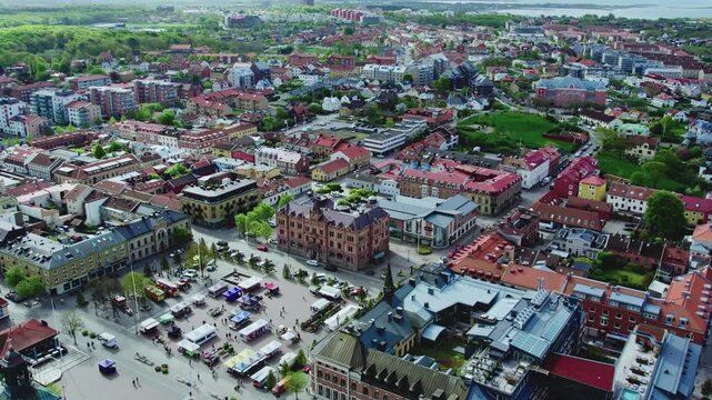 Small Street Market at Varberg Square in Varberg city. Drone view