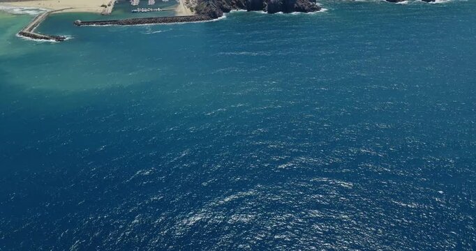 Aerial view of Buggerru's stunning blue sea and rugged coastline
