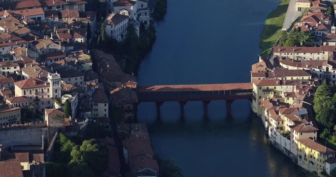 Aerial view of Ponte Vecchio, Bassano del Grappa, serene river scenery