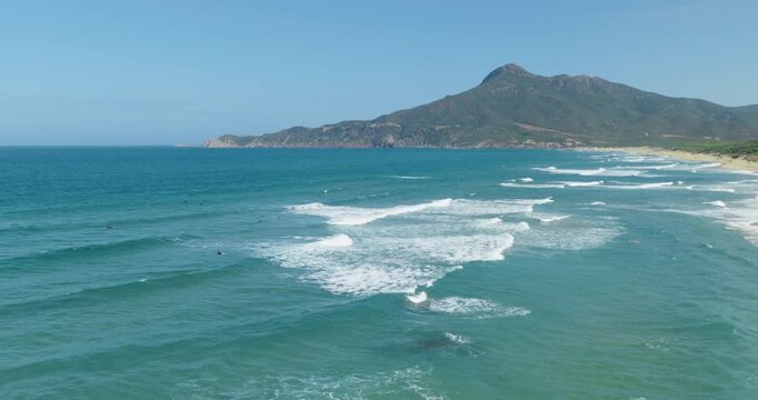 Scenic San Nicol&ograve; beach, Buggerru, peaceful waves, sunny day, aerial view