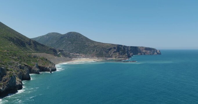 Coastal view of Buggerru, Sardegna with cliffs and blue sea serenity