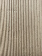 Brown corrugated cardboard sheet useful as a background - horizontal image