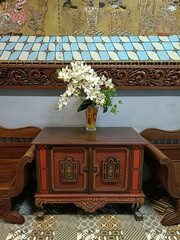 Orchid Bouquet on Antique Indonesian Cabinet