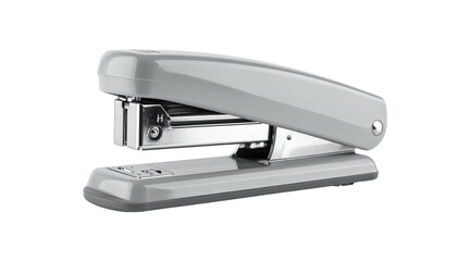 Grey stapler viewed close-up isolated against a black background