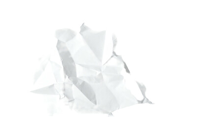 Crumpled white paper ball isolated on a stark black background