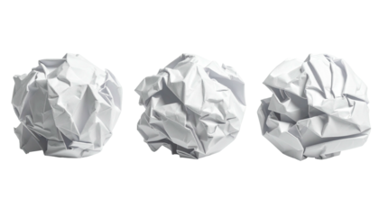 Three crumpled white paper balls isolated on a black background