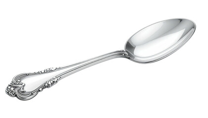 Shiny silver spoon with ornate handle lying diagonally