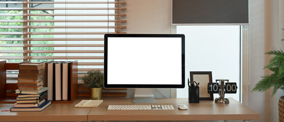 Computer empty screen on home office workspace