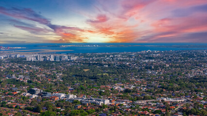 Panorama aerial drone view of western Sydney Suburbs of Canterbury Burwood Ashfield Marrickville Campsie with Houses roads and parks in Sydney New South Wales NSW Australia