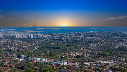 Panorama aerial drone view of western Sydney Suburbs of Canterbury Burwood Ashfield Marrickville Campsie with Houses roads and parks in Sydney New South Wales NSW Australia