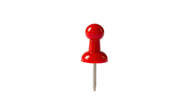Red thumbtack isolated on a stark black background, center frame