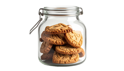 Jar filled with stacked shortbread cookies against a black background