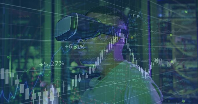 Standing man wearing collared shirt and VR headset in server room, with overlaid financial charts