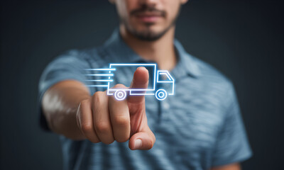 Man's finger activating futuristic glowing blue truck icon on dark background, symbolizing fast delivery and logistics technology for modern business solutions.